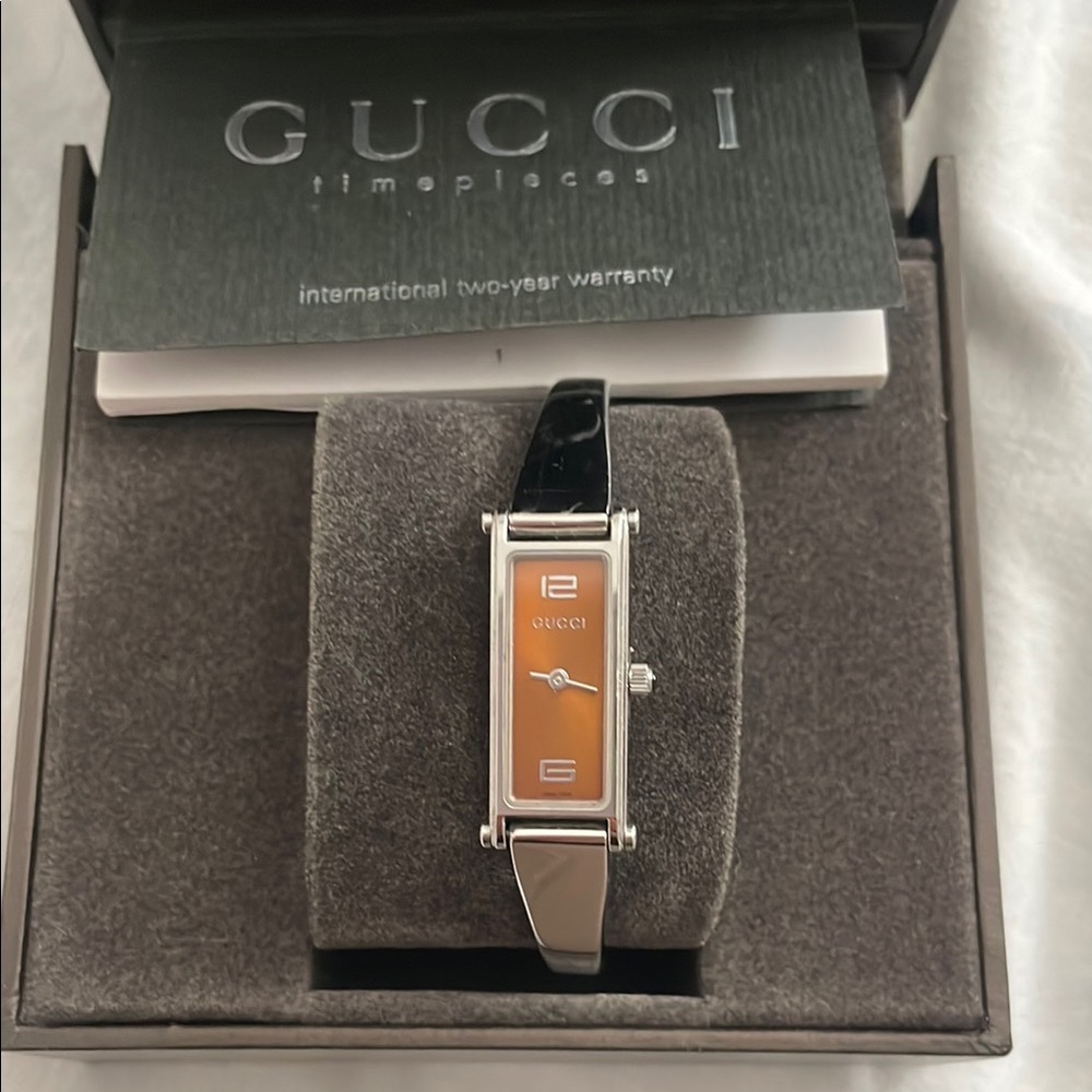 Gucci Women's Watch with Orange Dial and Black Strap